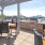 a patio with tables and chairs